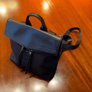 Brand new - tags still on - small black backpack